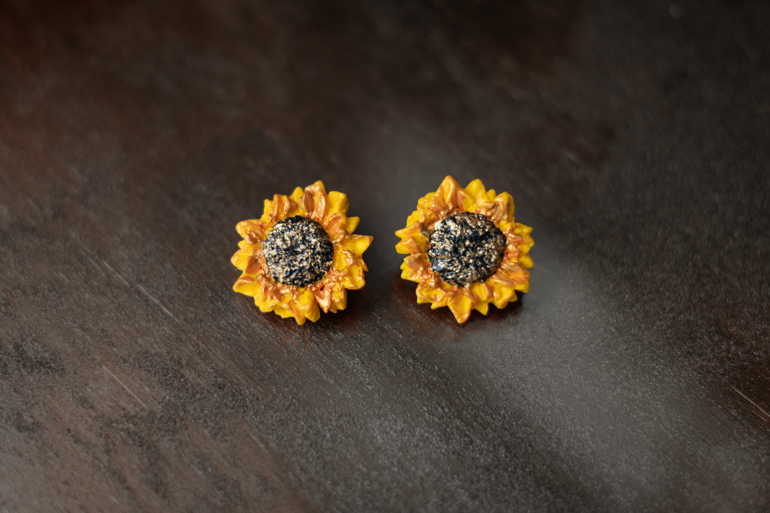 Auskari "Saulespuķes"